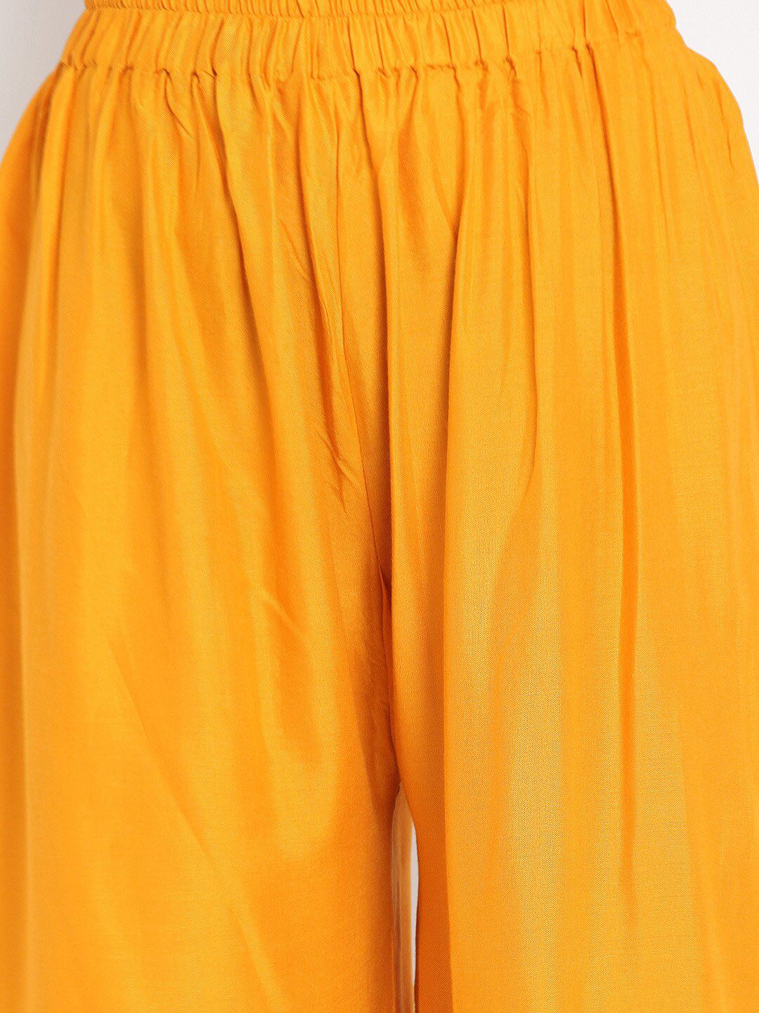 Dhimhi Women's Mustard Yellow Solid Flared Palazzos