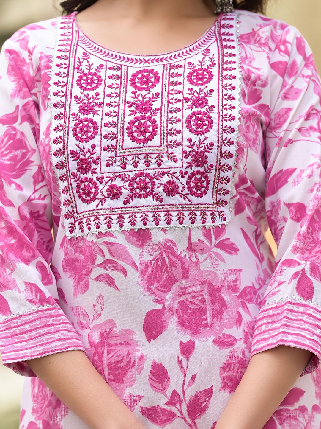Dhimhi women's floral printed kurta set with matching trousers and dupatta, showcasing intricate thread work and vibrant design.