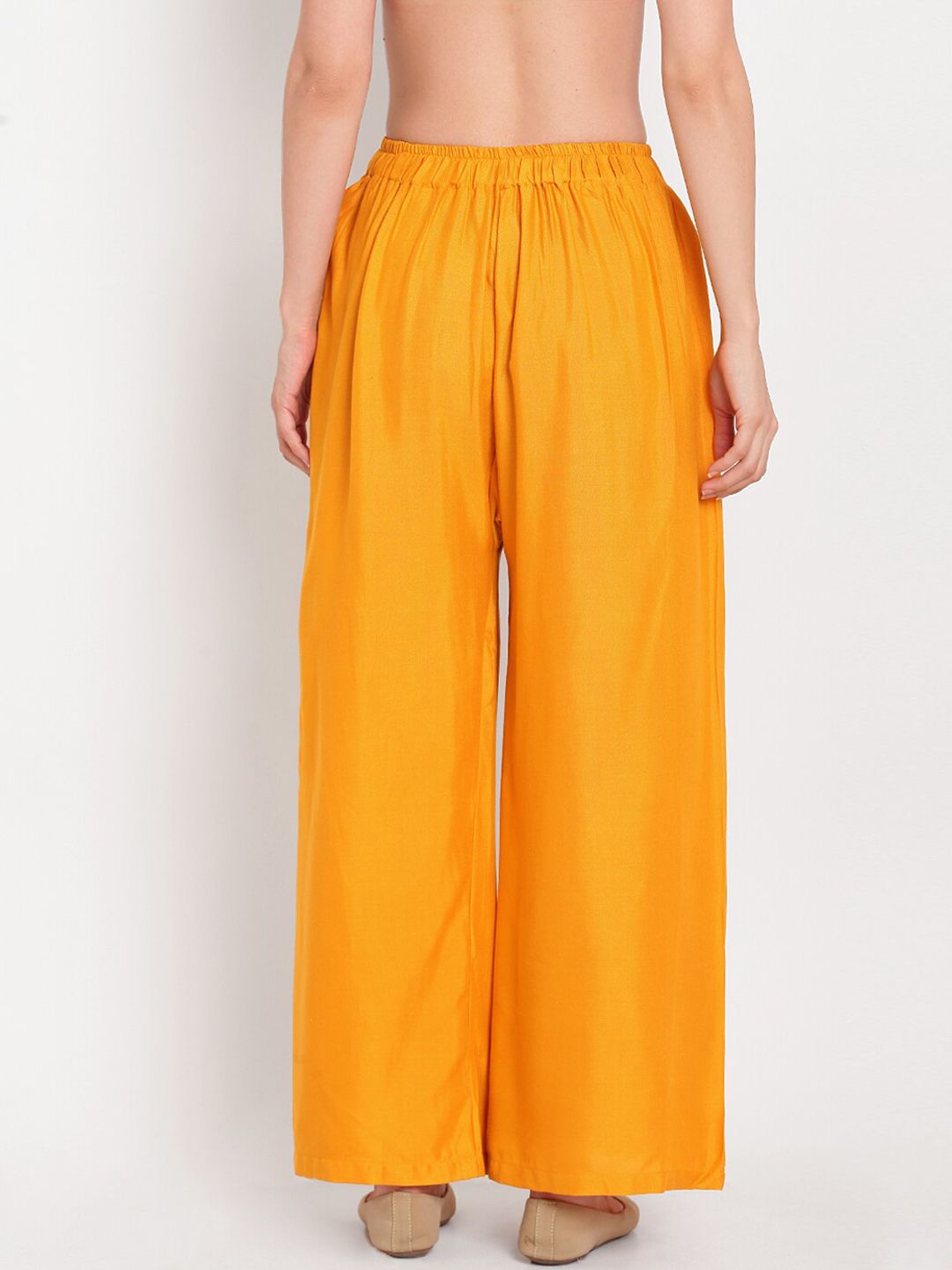 Dhimhi Women's Mustard Yellow Solid Flared Palazzos