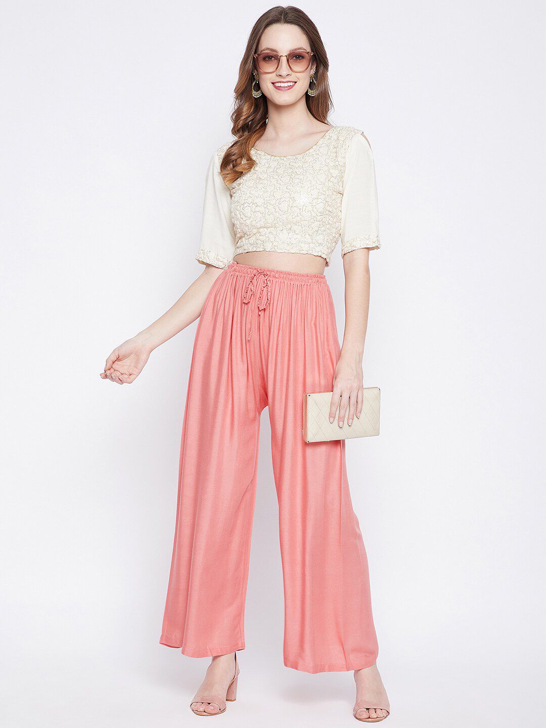Dhimhi Women's Peach-Coloured Flared Palazzos