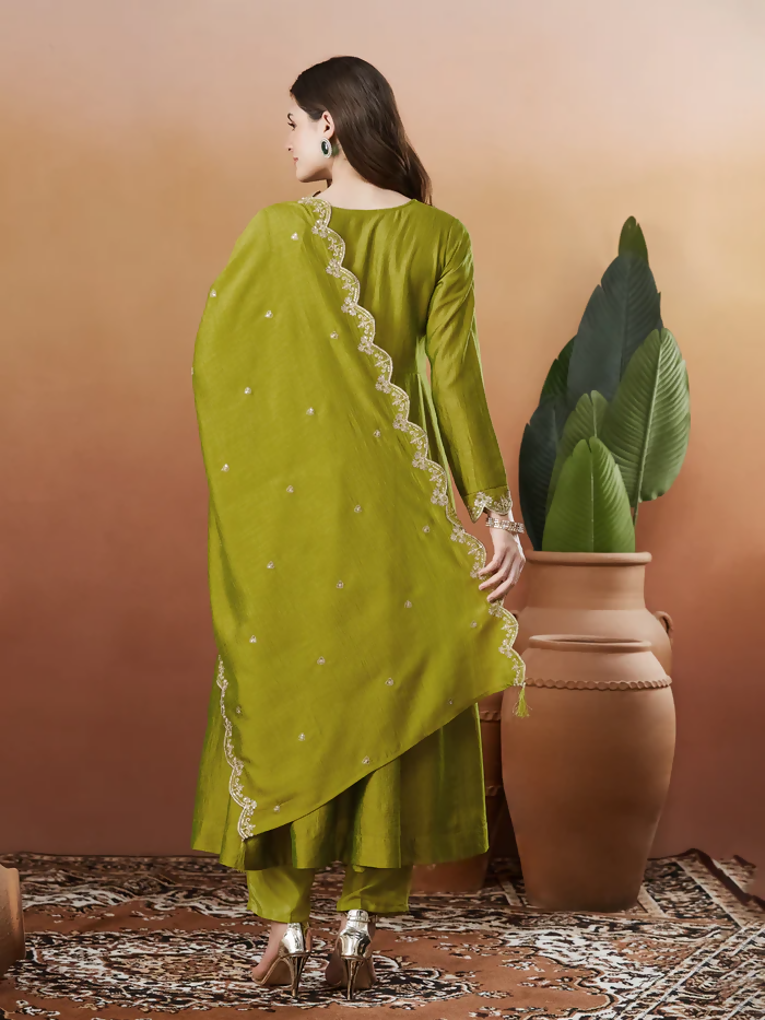 Dhimhi women's light green Vichitra silk kurta set with embroidered work, flared Anarkali pants, and matching dupatta.