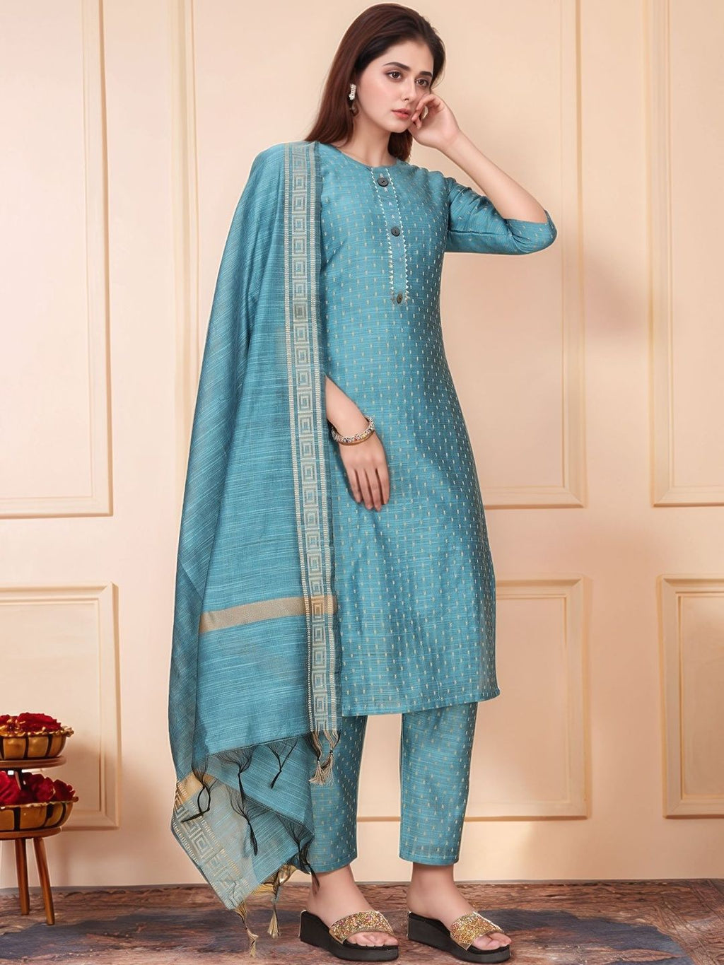 Dhimhi women's regular kurta set with matching trousers and dupatta, featuring traditional design and comfortable fit.