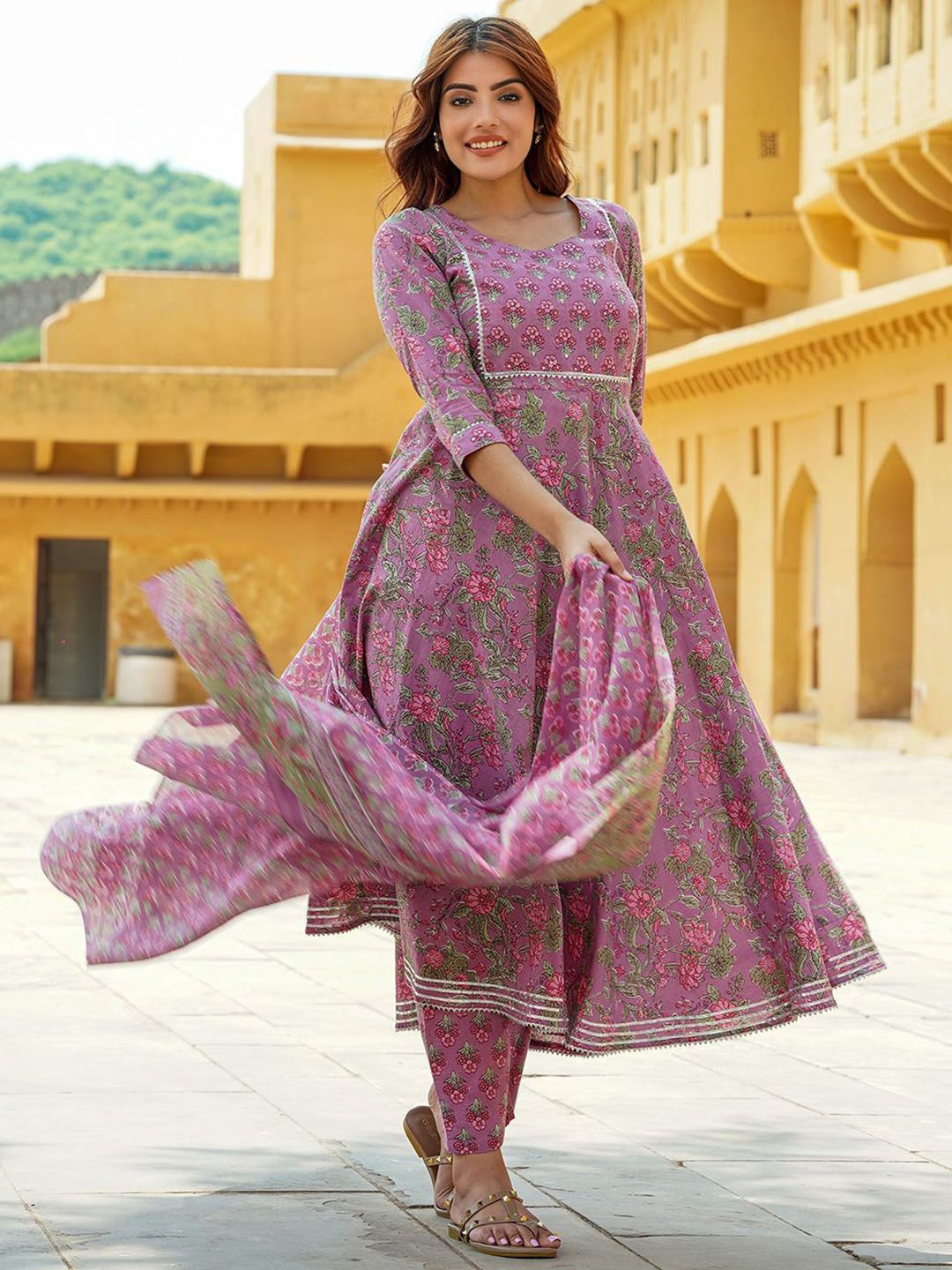 Dhimhi women's floral printed cotton Anarkali kurta set with trousers and dupatta, showcasing vibrant floral patterns and traditional design.