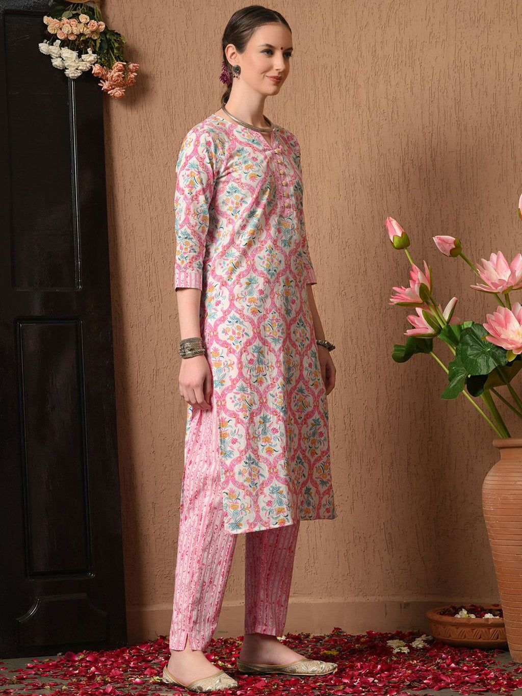 Dhimhi women's floral printed cotton kurta set with matching trousers and dupatta, showcasing vibrant flower designs and comfortable fit.