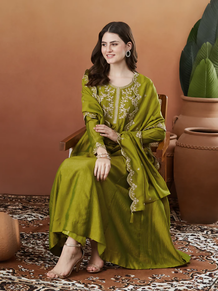 Light green Dhimhi women's Vichitra silk embroidered kurta set with flared anarkali pants and matching dupatta, elegant traditional attire.