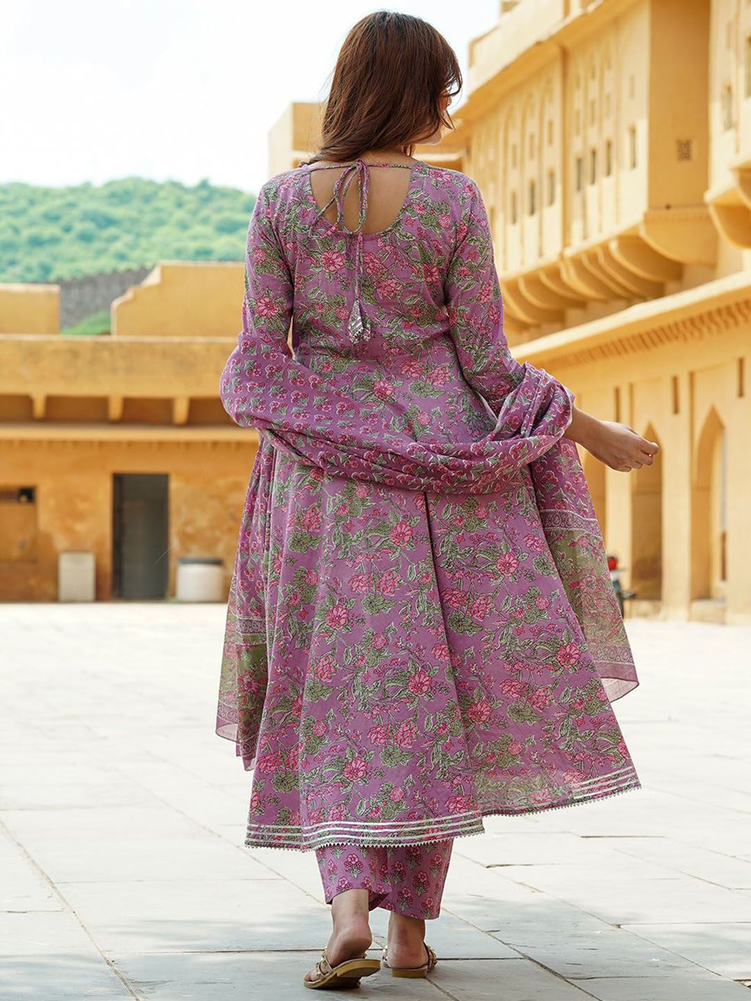 Dhimhi women's floral printed cotton anarkali kurta set with matching trousers and dupatta, featuring vibrant floral patterns.