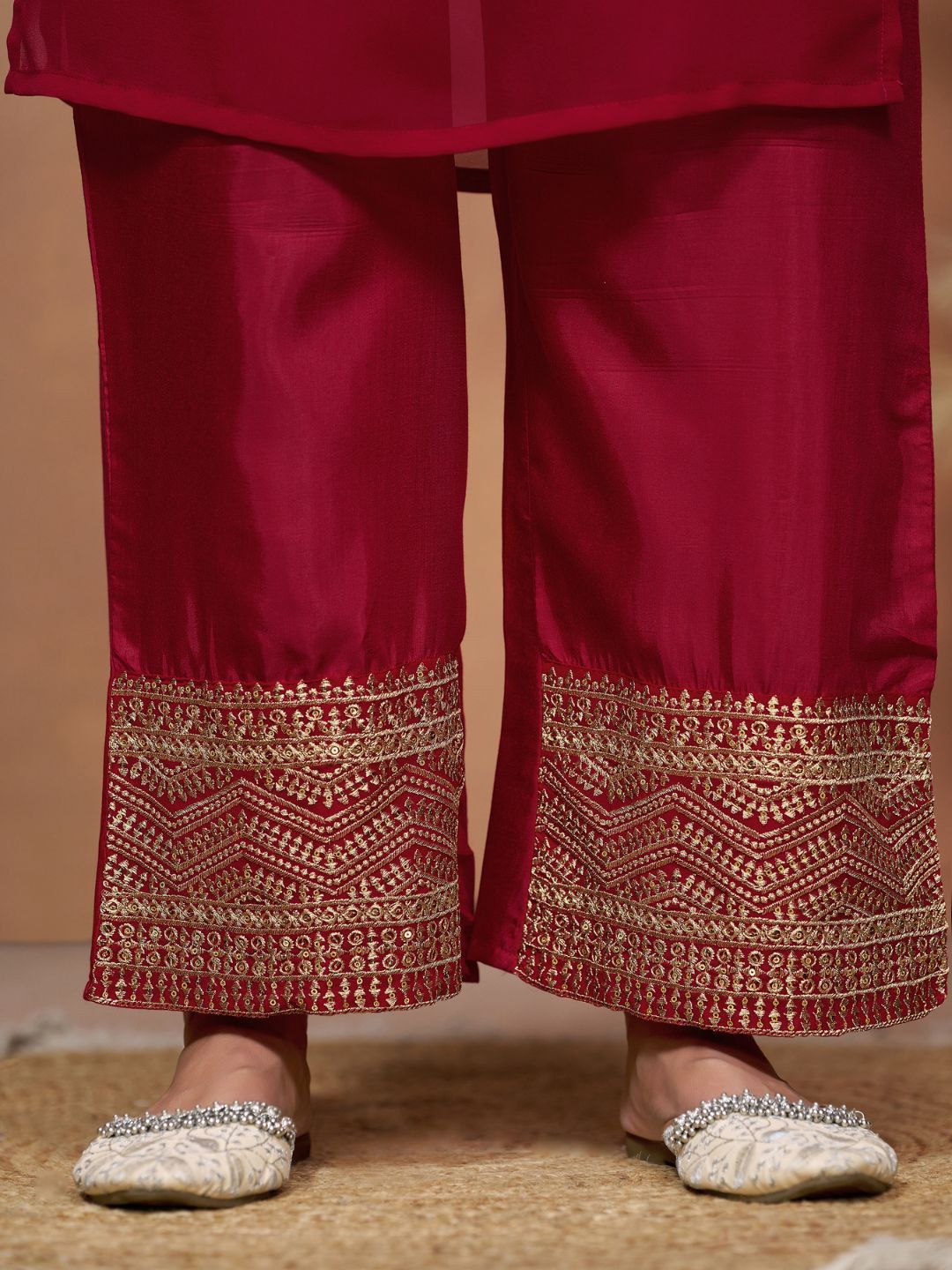 Dhimhi women’s embroidered kurta and dupatta set with intricate threadwork, featuring a traditional design and vibrant fabric.