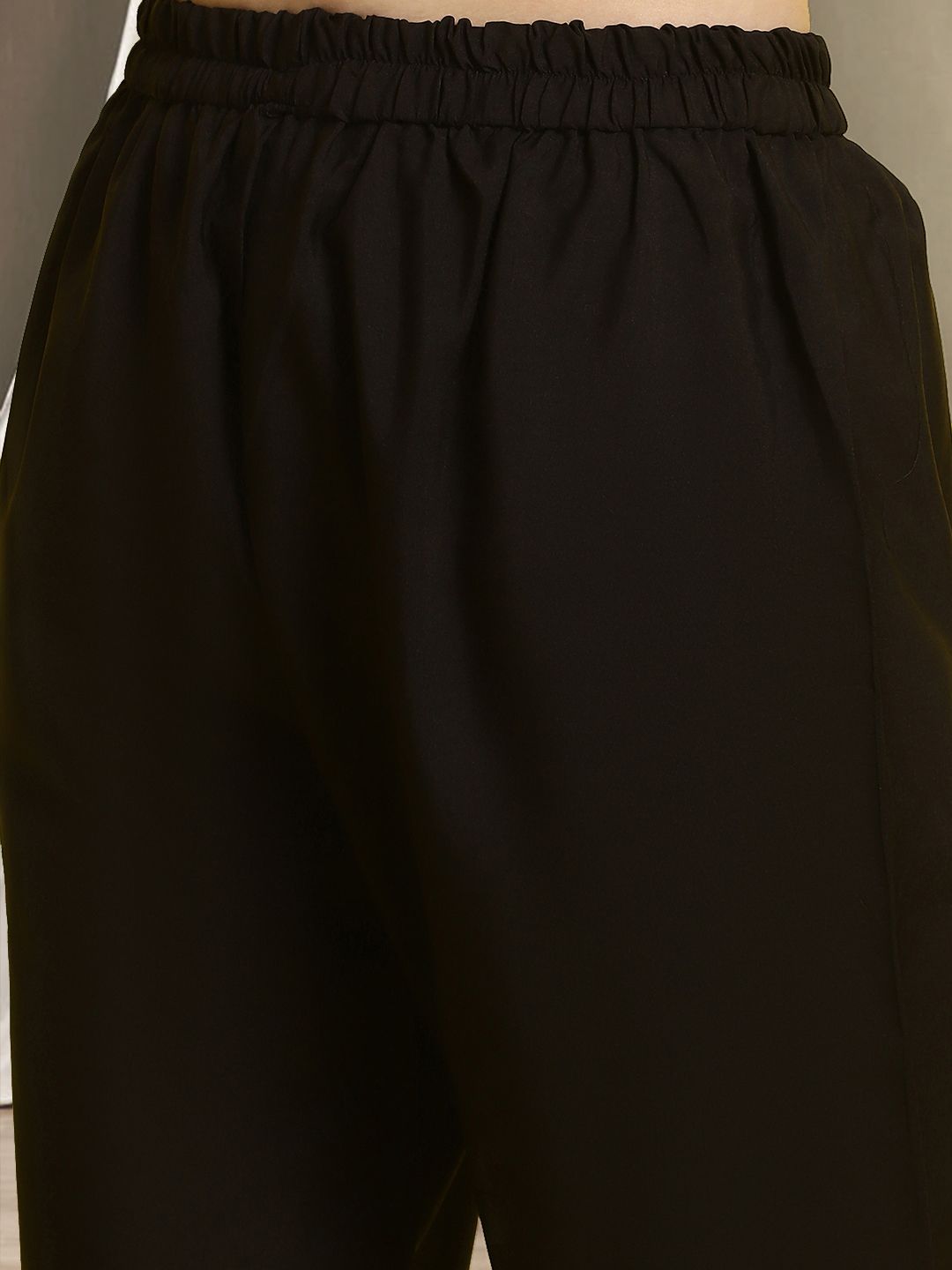 Dhimhi women’s ethnic motifs printed kurta set with round neck straight kurta and matching trousers, traditional Indian style.