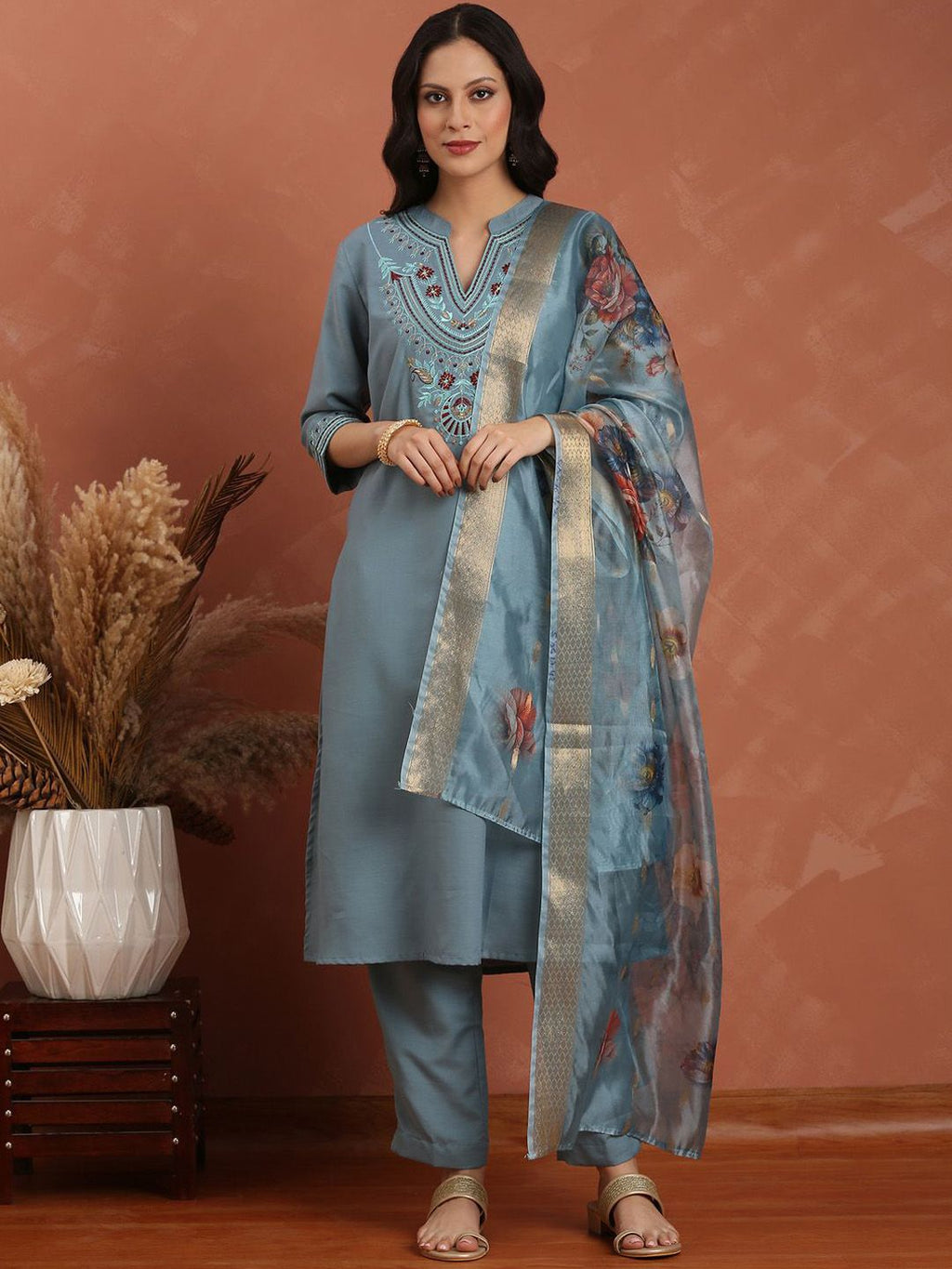 Dhimhi women's floral embroidered kurta set with trousers and dupatta, featuring regular thread work and vibrant traditional design.