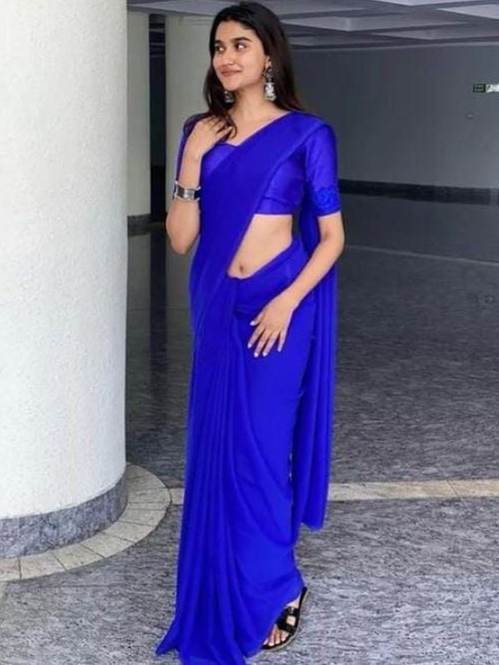 Dhimhi Women's Blue Poly Georgette Solid Sarees